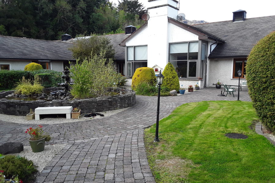 View of Carkingford Nursing Home from exterior showing water feature