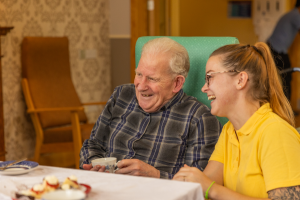 Esker Rí resident and activities manager laughing together