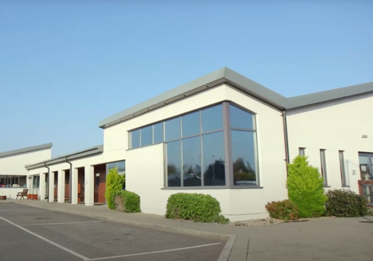 Exterior photo of Sunhill Nursing Home in sunshine